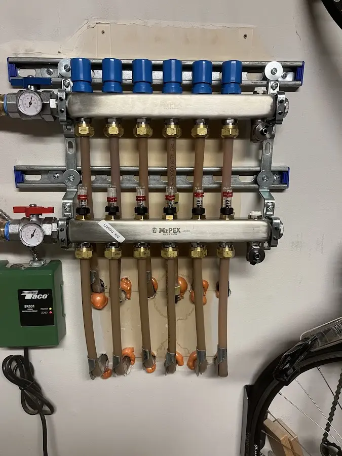 Plumber performing Water Heater Repair at a residential property in Brigham City